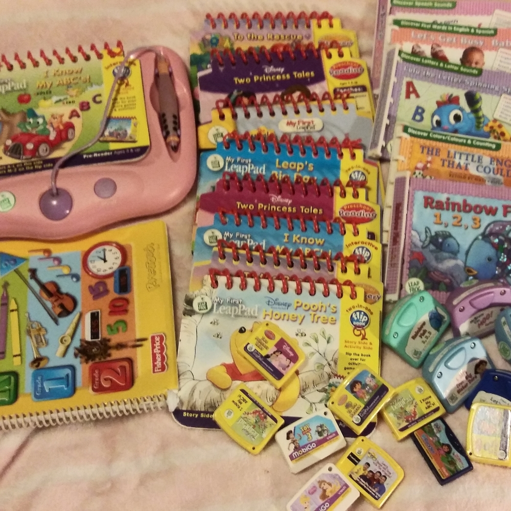 Leap Pads with lots of extras and carrying bag